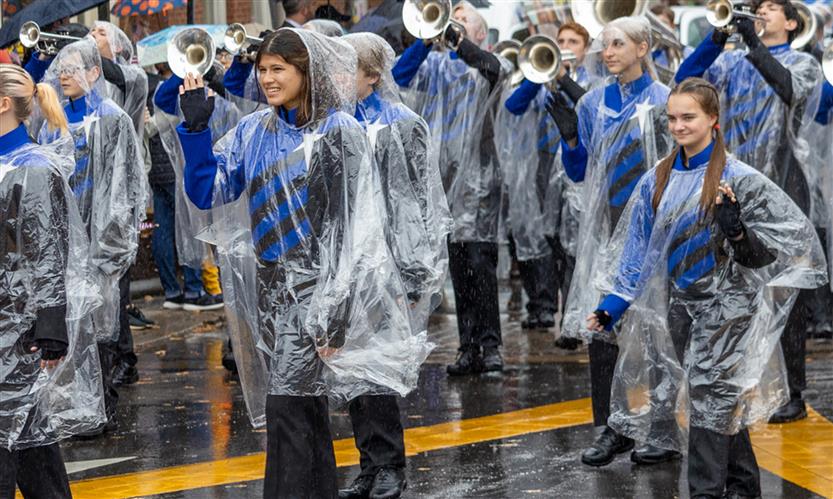 Students march in a Veterans Day Parade